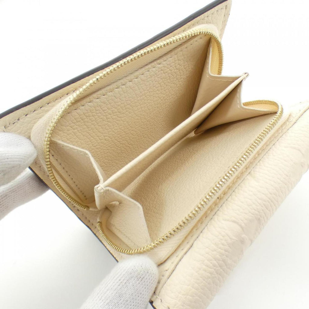 Louis Vuitton Monogram Empreinte Leather Wallet (Tri-Fold)