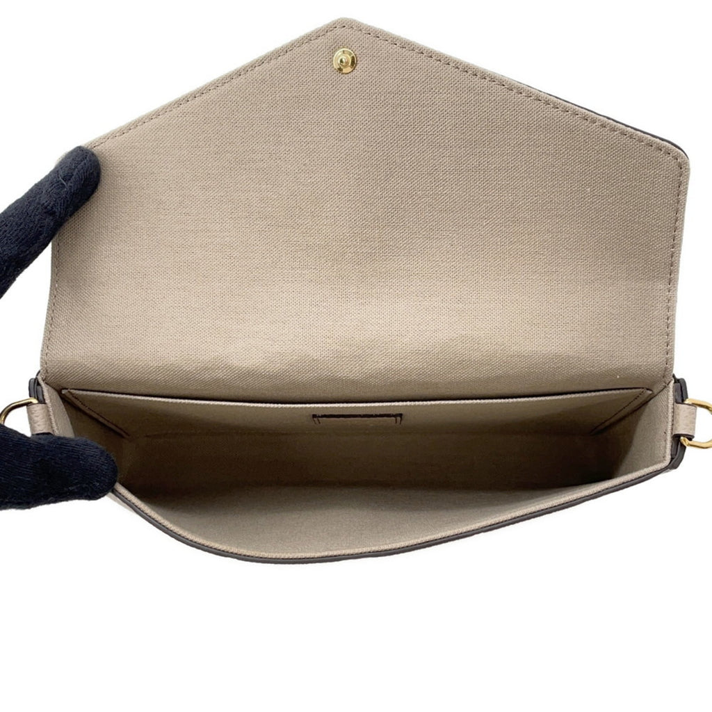Louis Vuitton Monogram Monogram Empreinte Pochette Pouch