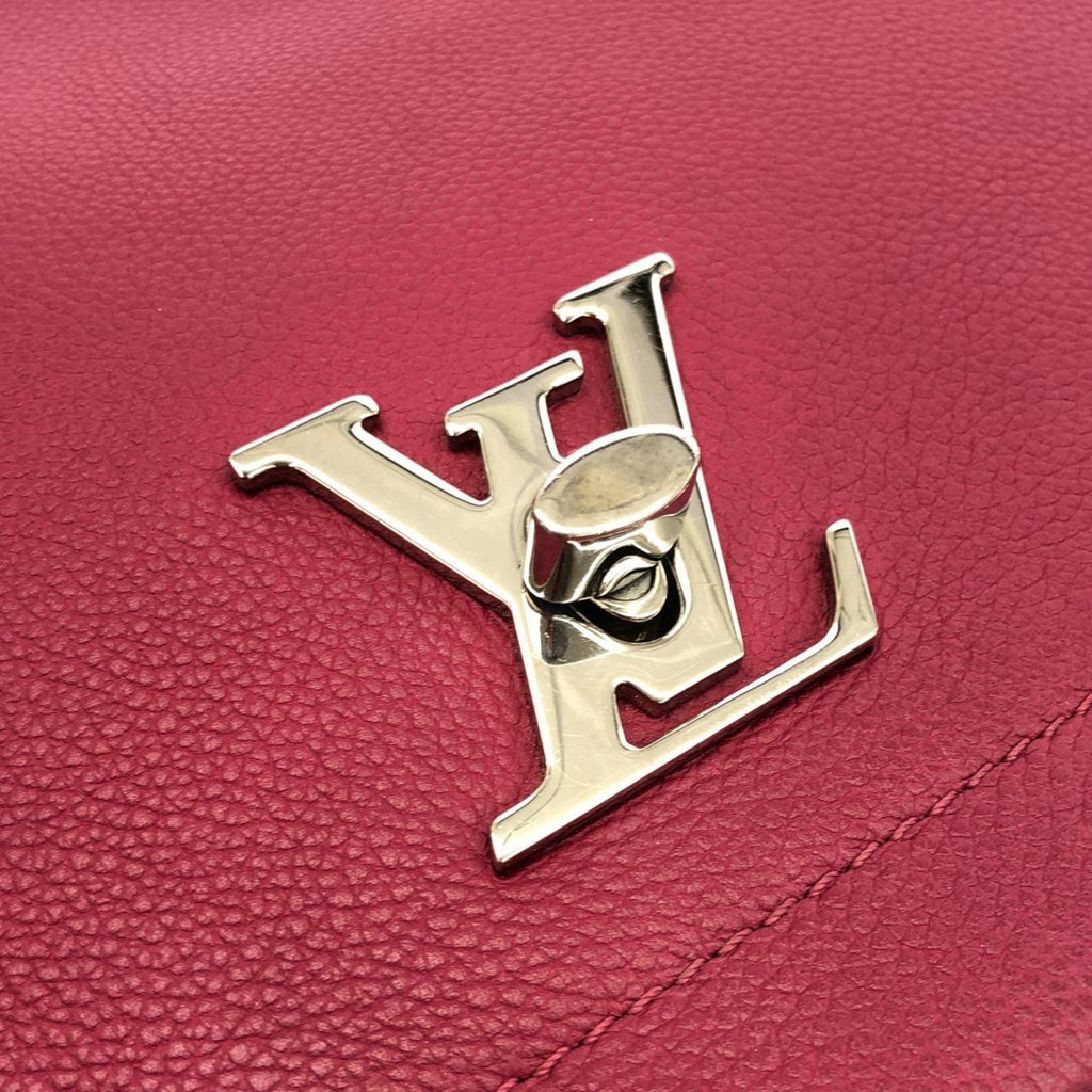 Louis Vuitton Dahlia Leather Handbag
