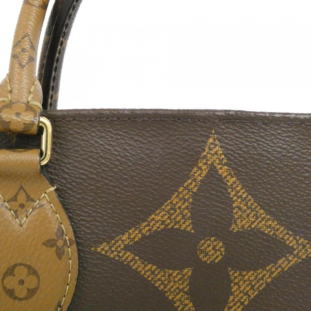 Louis Vuitton Marron Coated Canvas Handbag