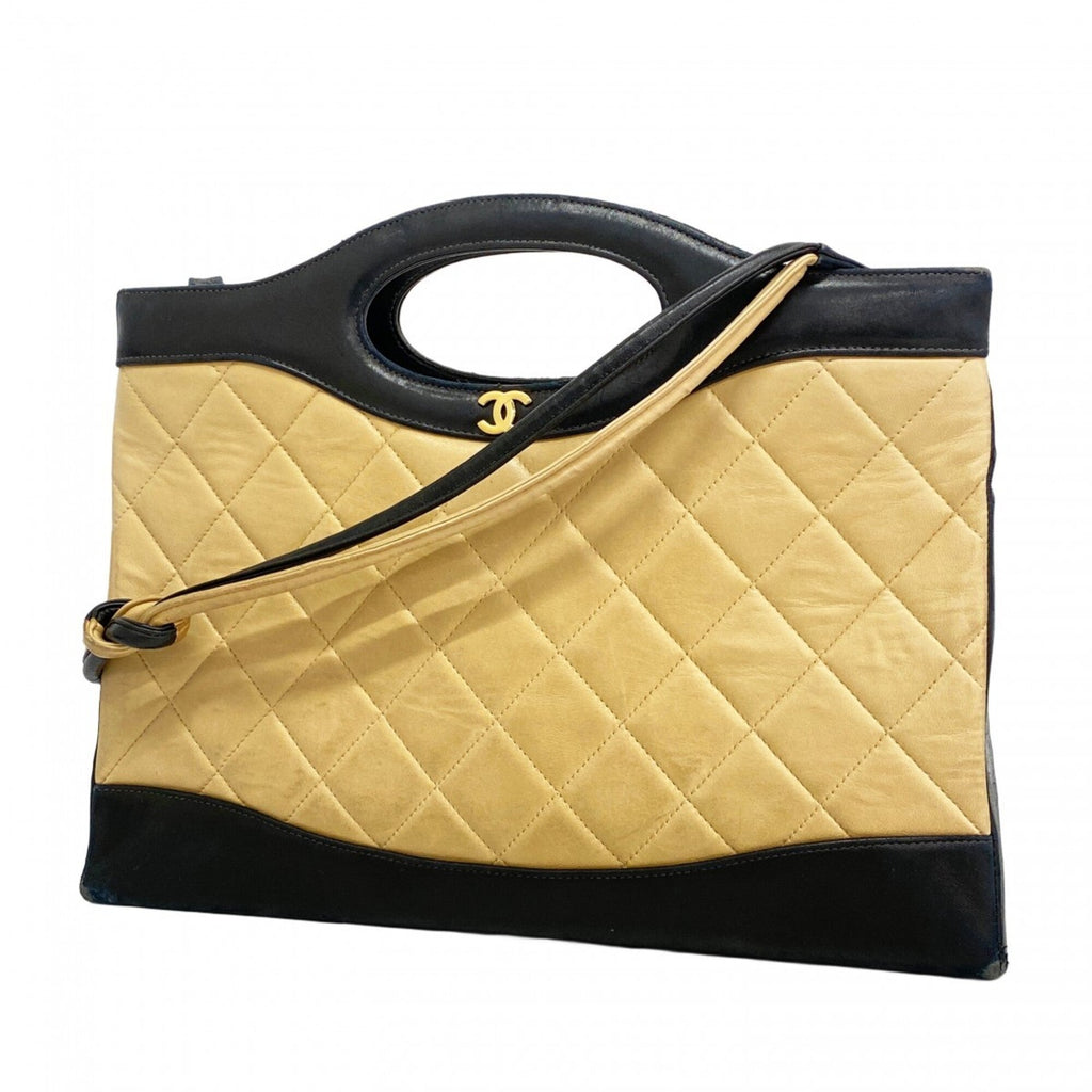 Chanel Beige Black Leather Handbag
