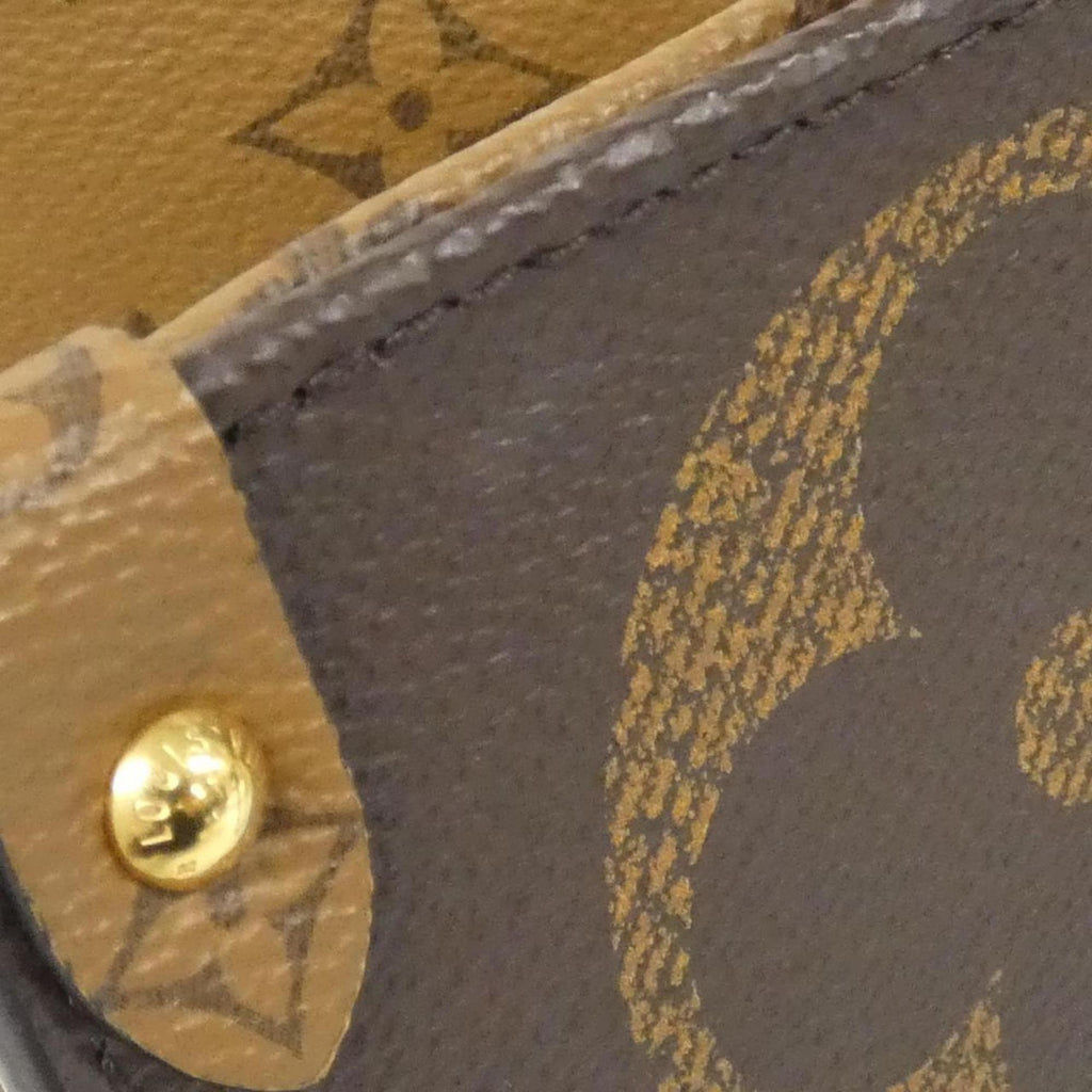 Louis Vuitton Brown Coated Canvas Handbag