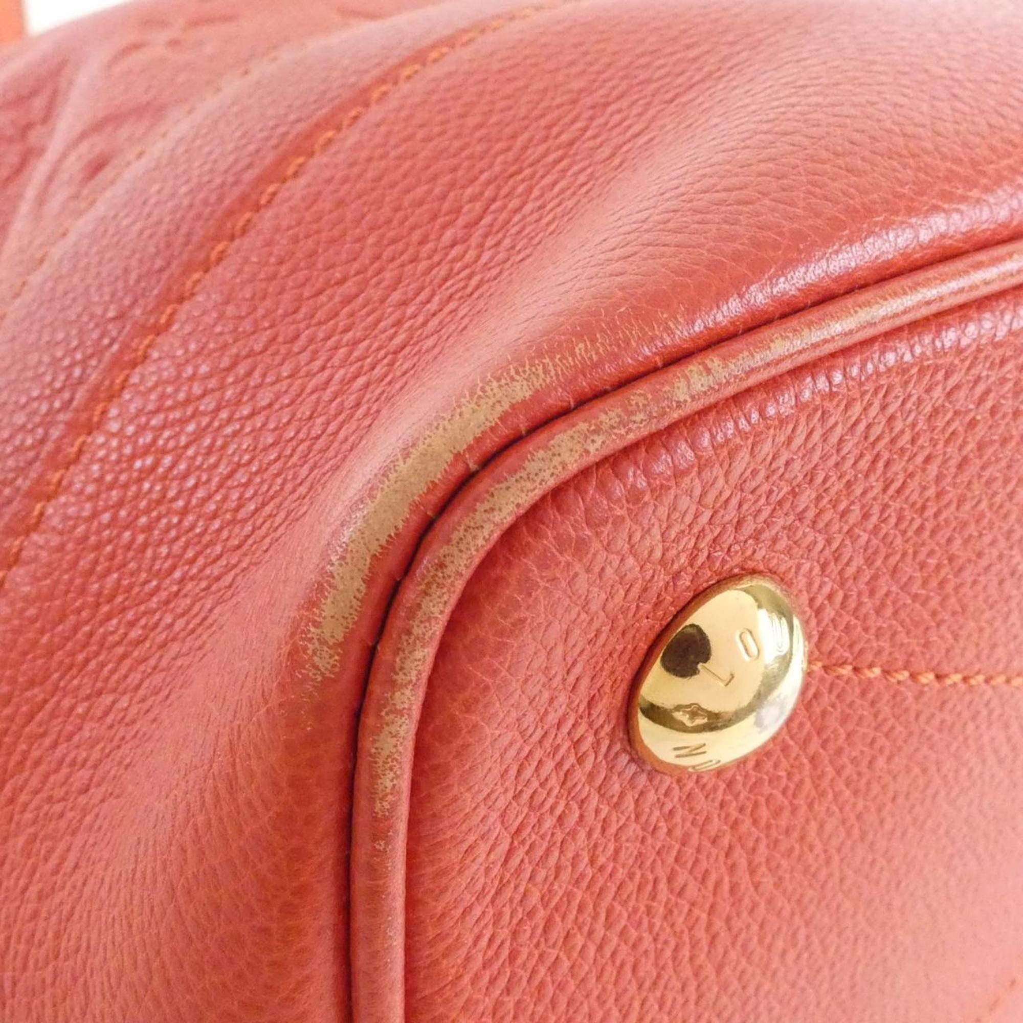 Louis Vuitton Monogram Empreinte Gold Leather Handbag