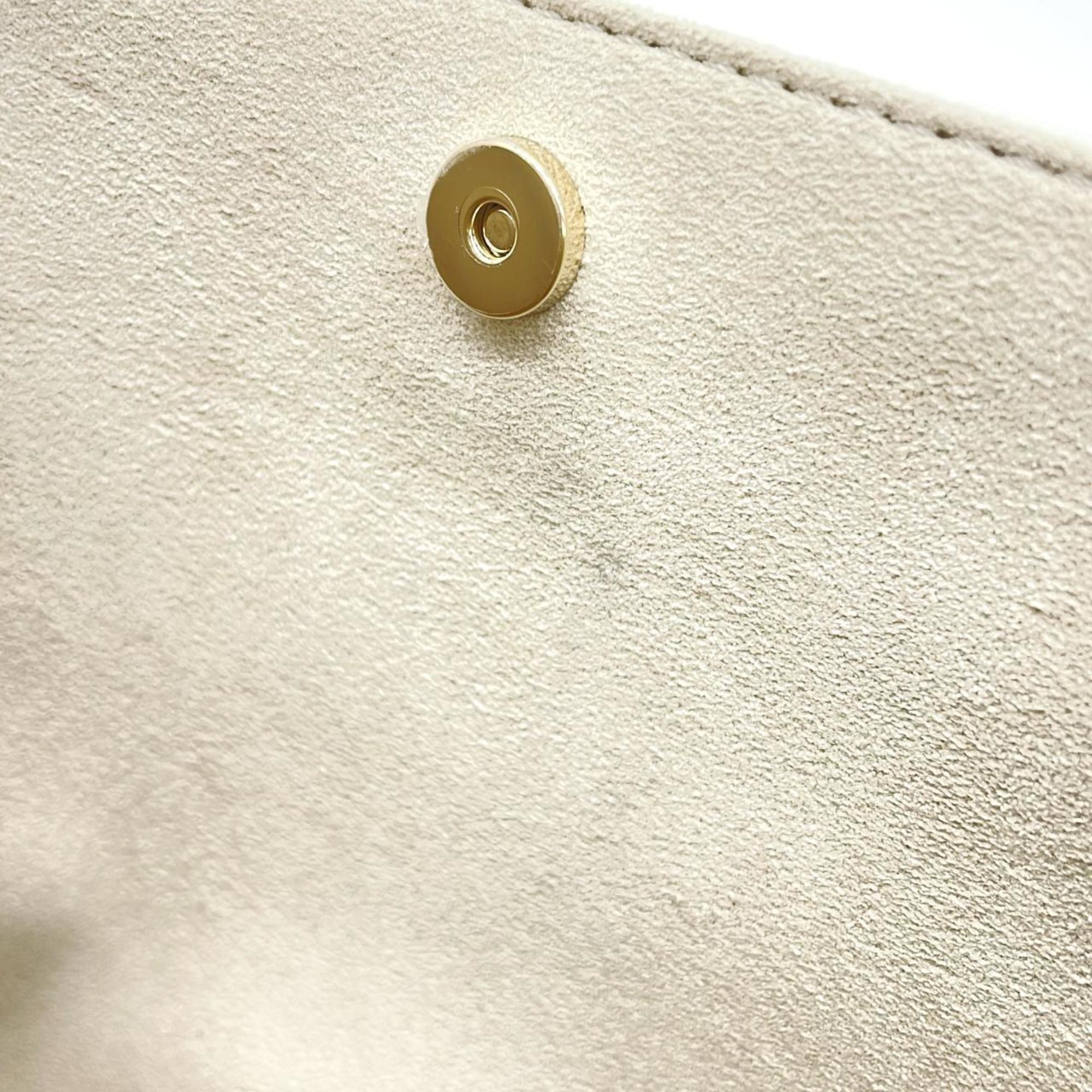 Louis Vuitton Dune Leather Handbag