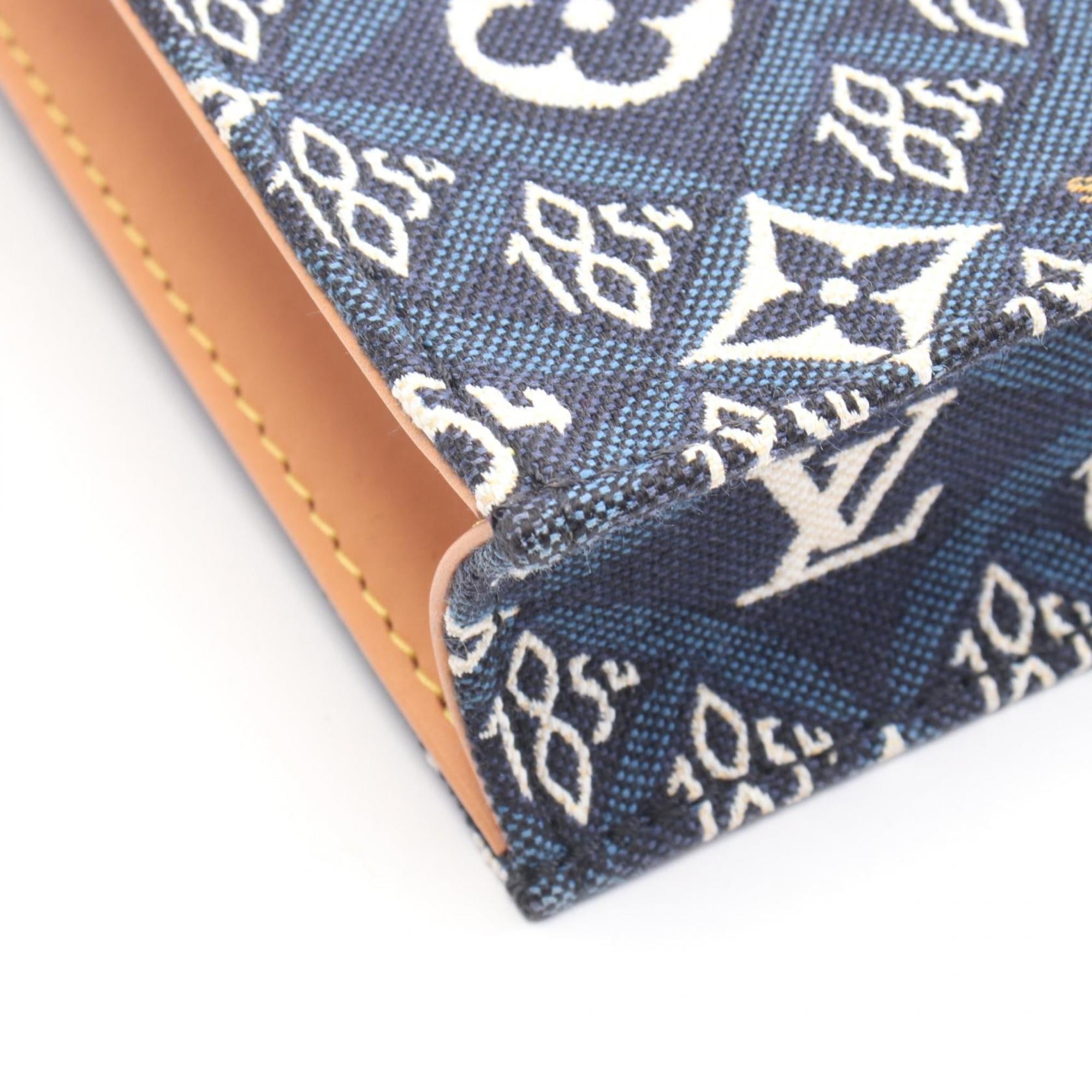 Louis Vuitton Brown Navy White Canvas Leather Handbag