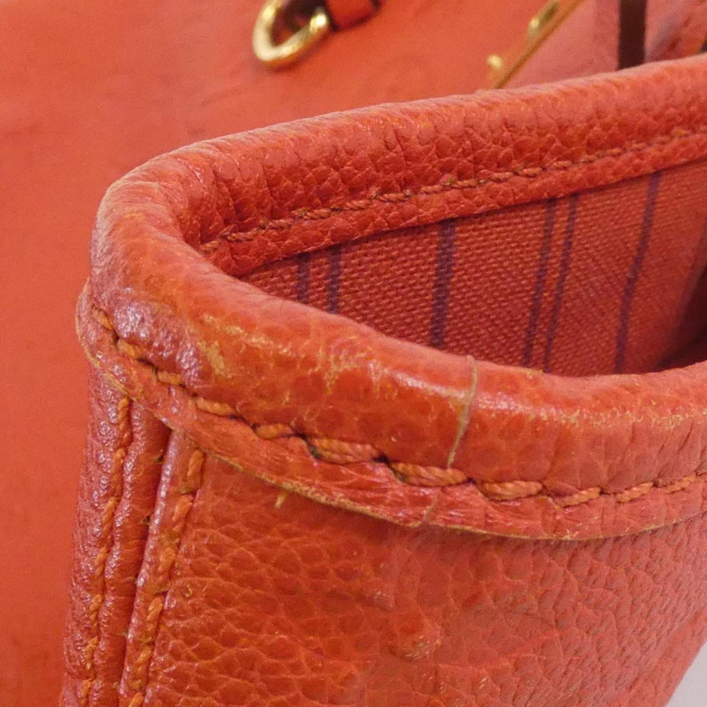 Louis Vuitton Monogram Empreinte Gold Leather Handbag