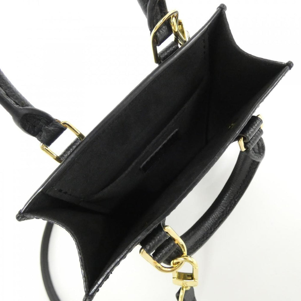 Louis Vuitton Monogram Empreinte Beige Black Leather Handbag