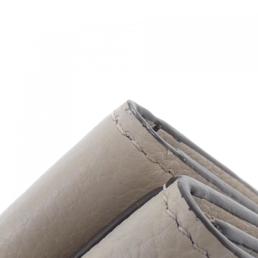 Louis Vuitton Grayish Leather Wallet (Tri-Fold)