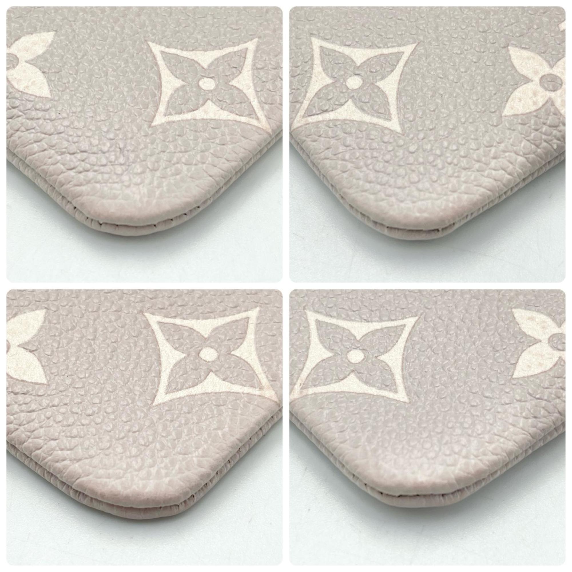 Louis Vuitton Grayish Monogram Empreinte Pochette