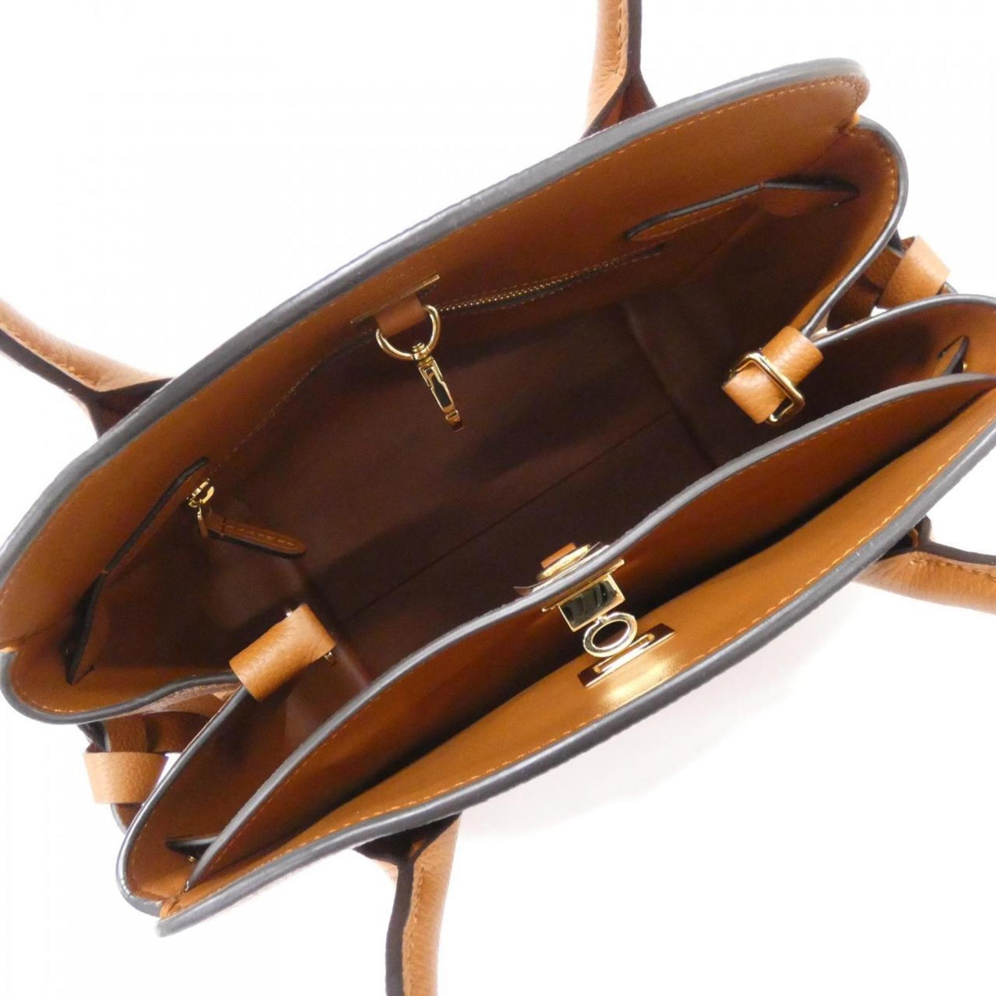 Louis Vuitton Gold Leather Handbag