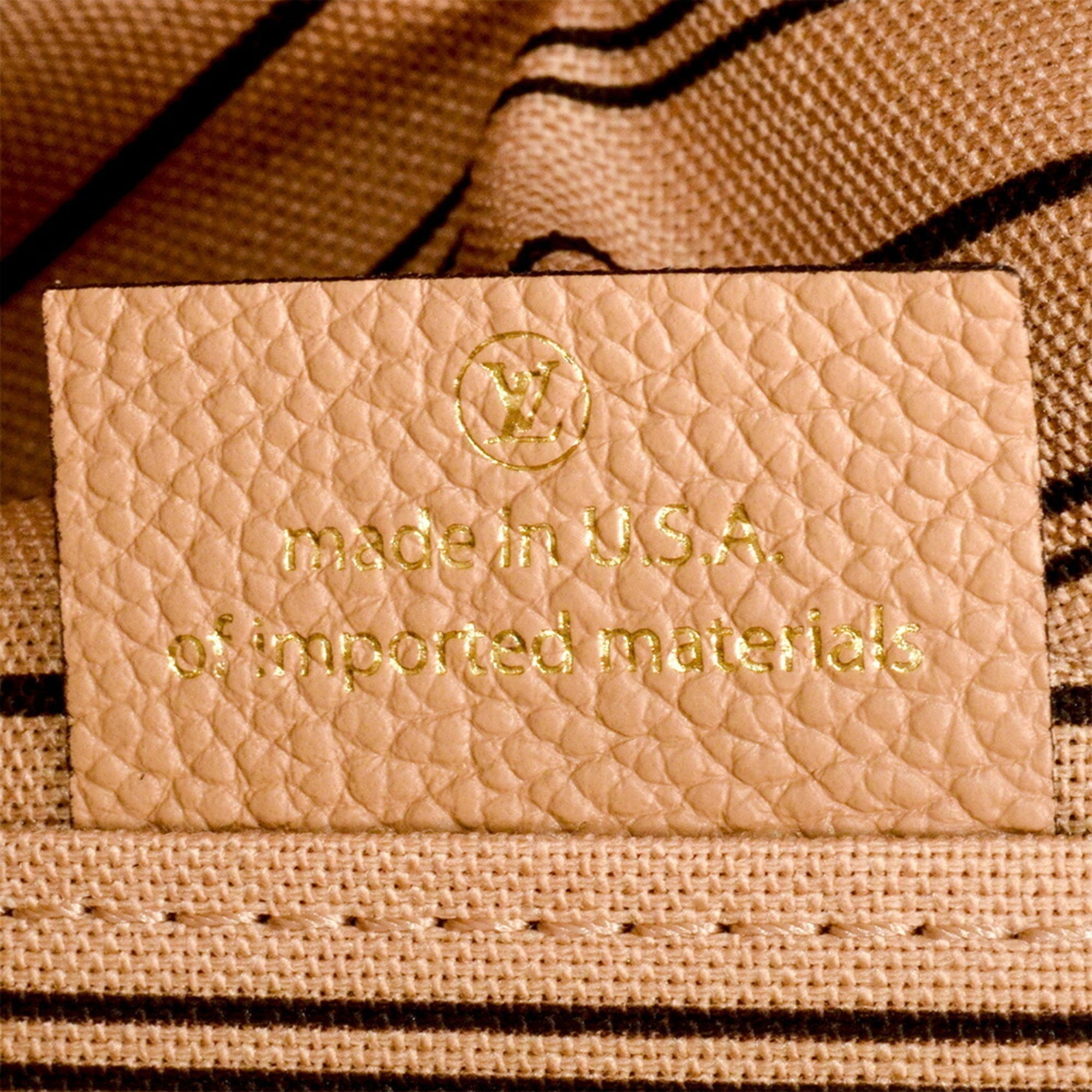 Louis Vuitton Dune Monogram Monogram Empreinte Handbag