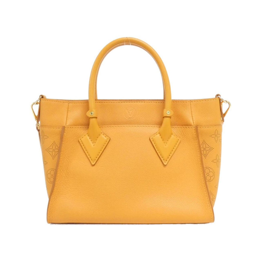 Louis Vuitton Gold Leather Handbag