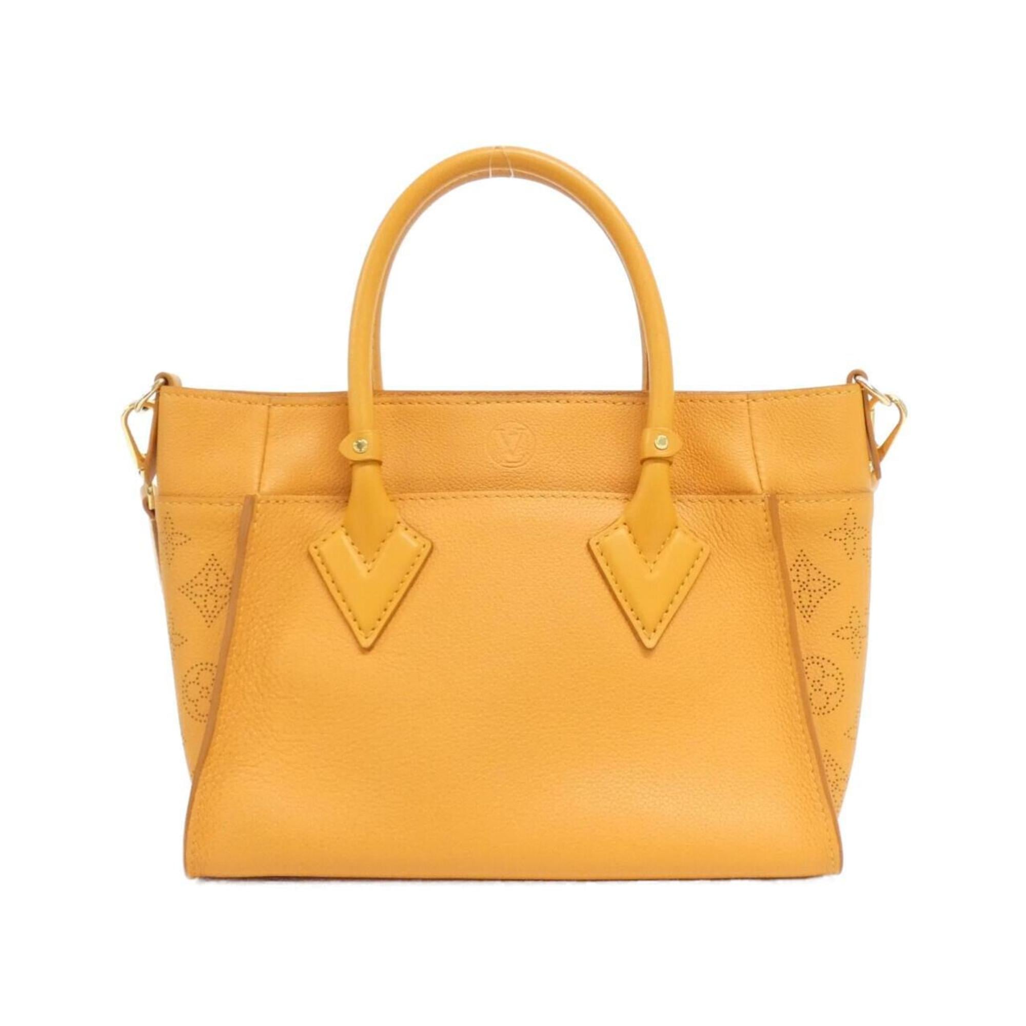 Louis Vuitton Gold Leather Handbag