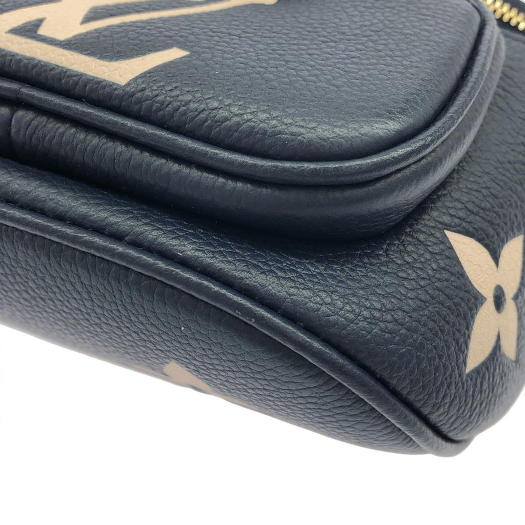 Louis Vuitton Cream Navy Leather Handbag