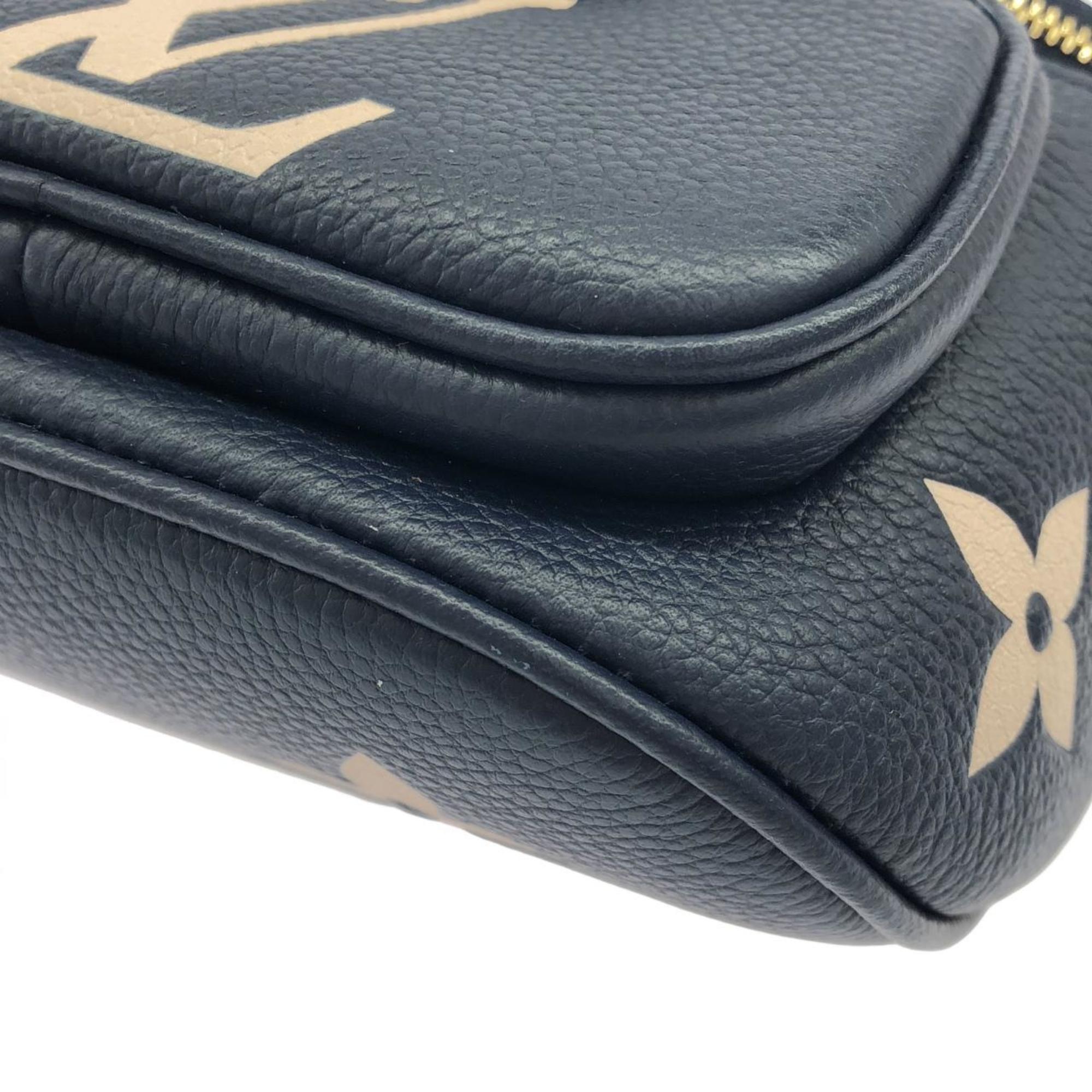 Louis Vuitton Cream Navy Leather Handbag