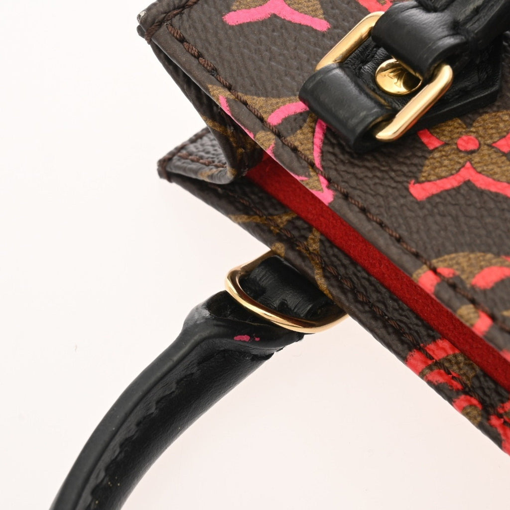 Louis Vuitton Brown Monogram Canvas Handbag