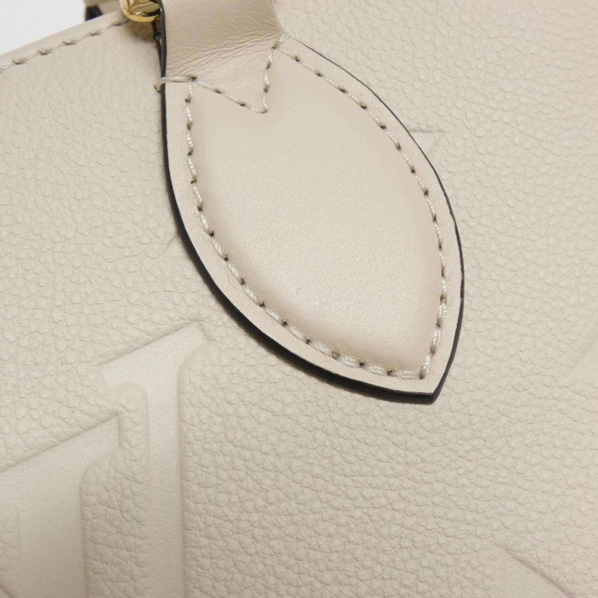 Louis Vuitton Monogram Empreinte Gold Leather Handbag
