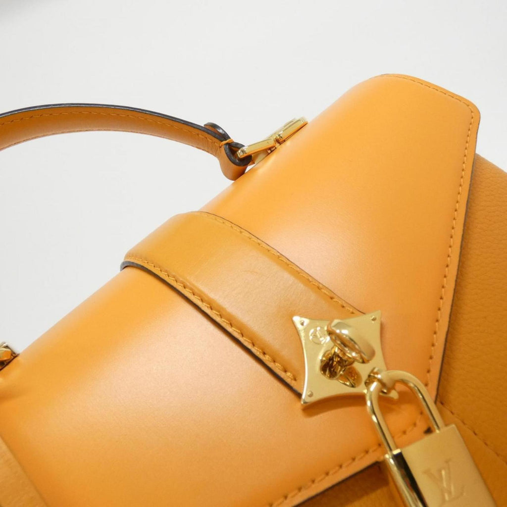 Louis Vuitton Gold Leather Handbag