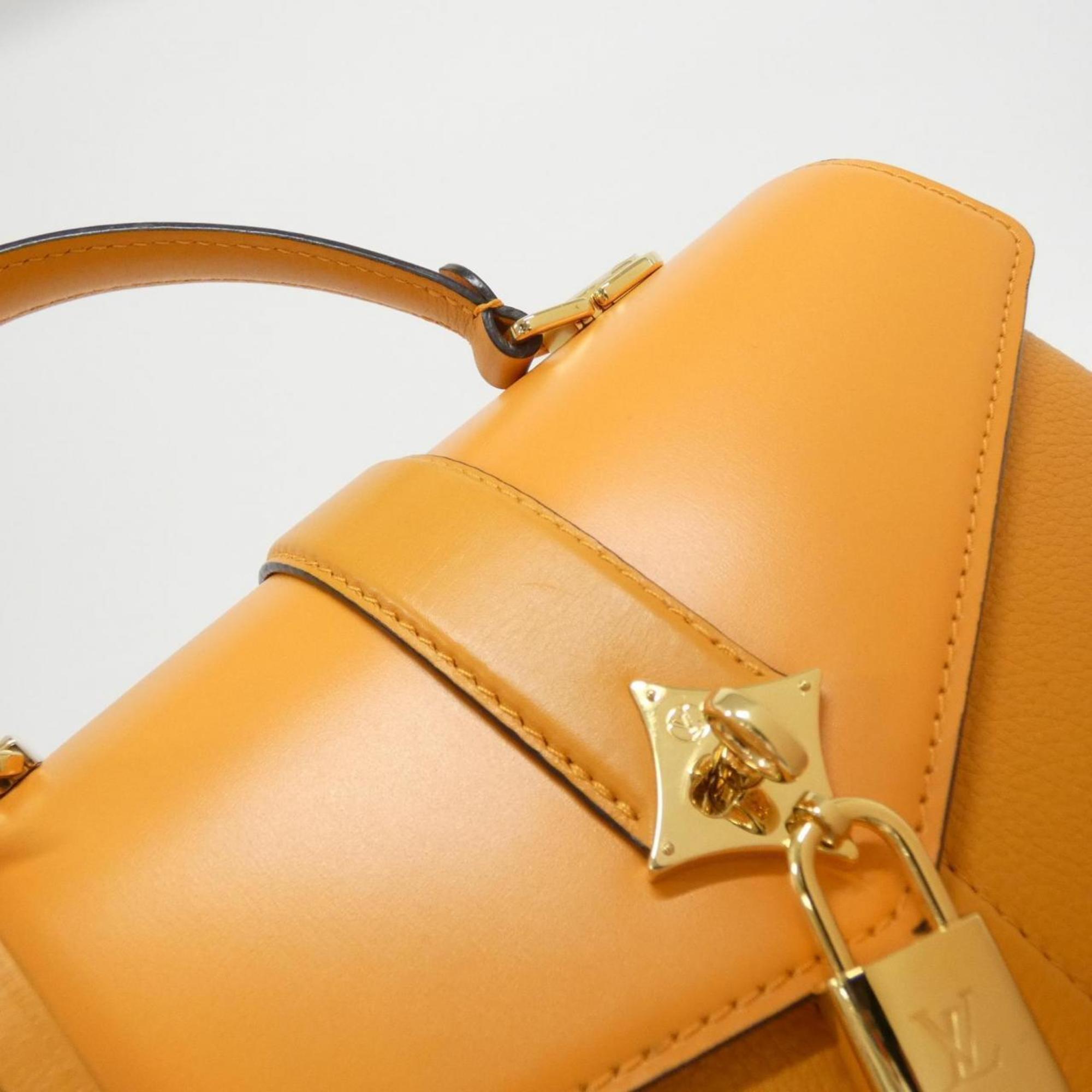 Louis Vuitton Gold Leather Handbag