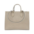 Louis Vuitton Tourterelle Leather Handbag