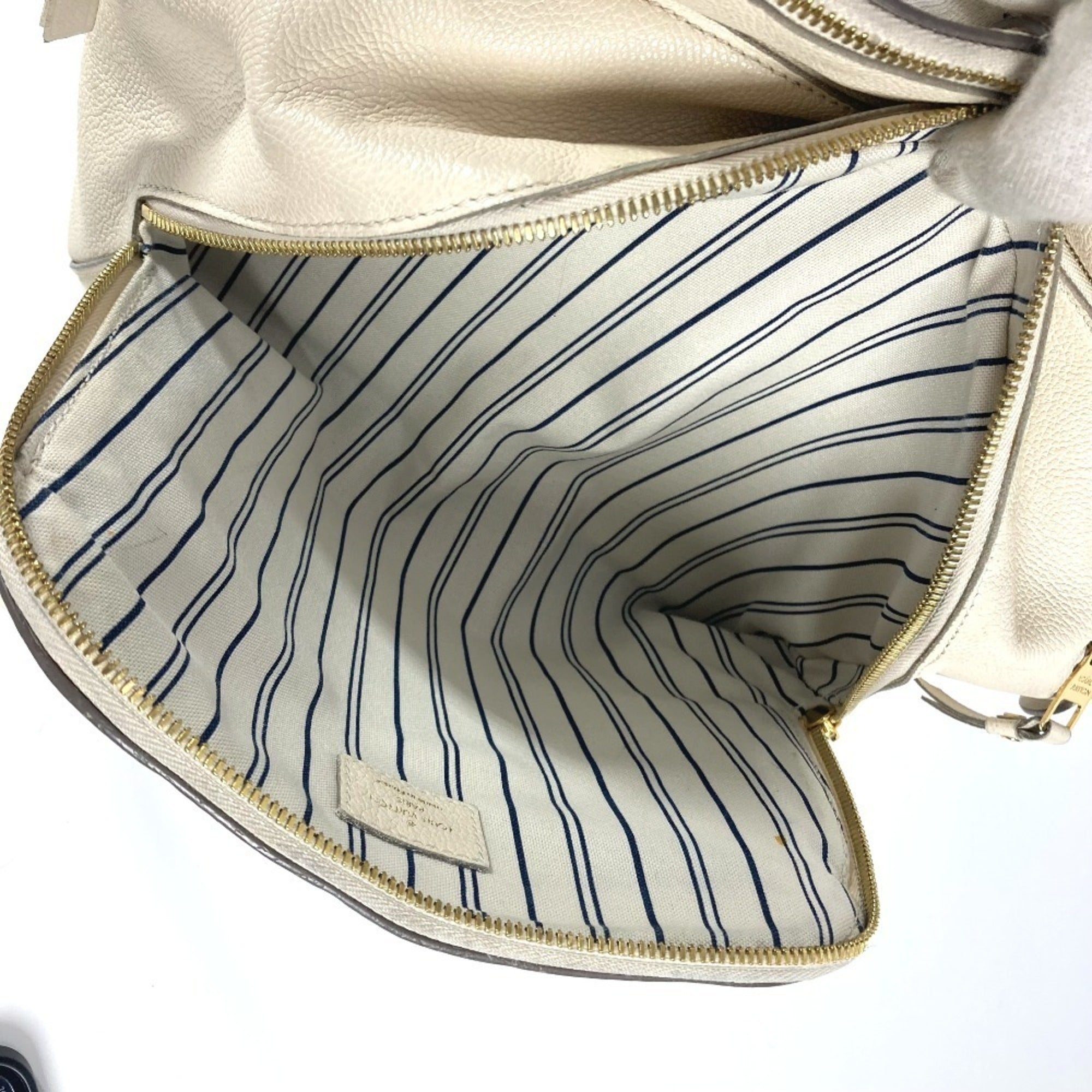 Louis Vuitton Monogram Empreinte Neige White Monogram Empreinte Handbag Tote Bag