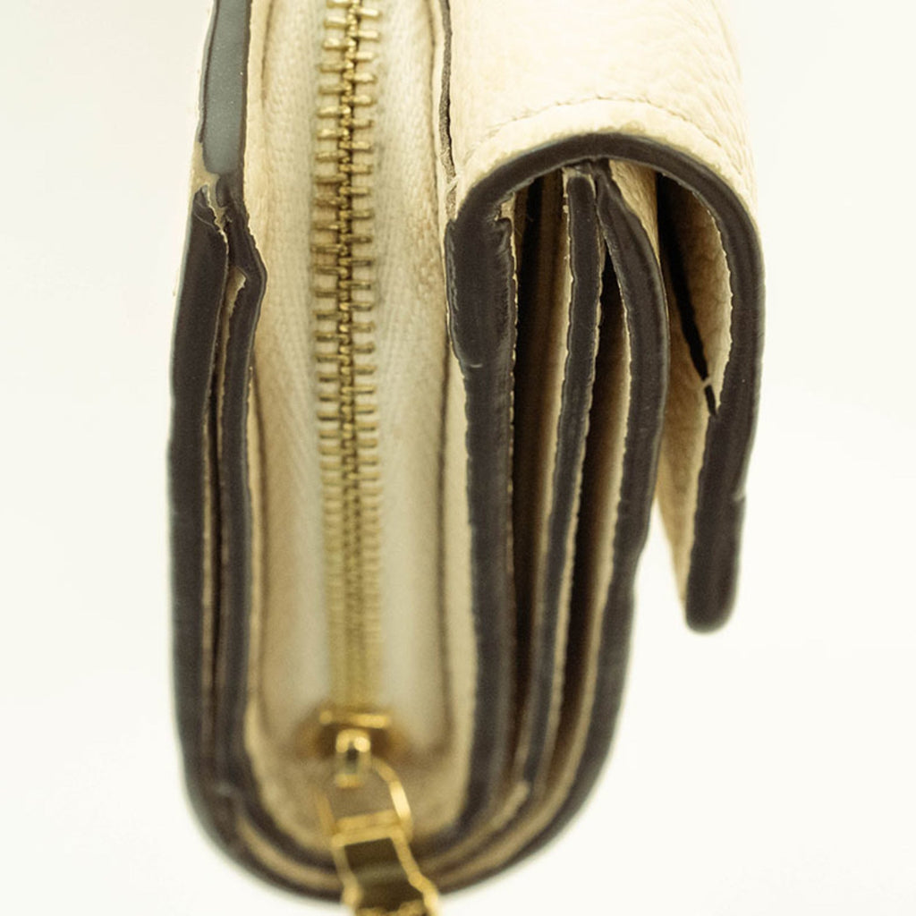 Louis Vuitton Cream Monogram Empreinte Leather Wallet