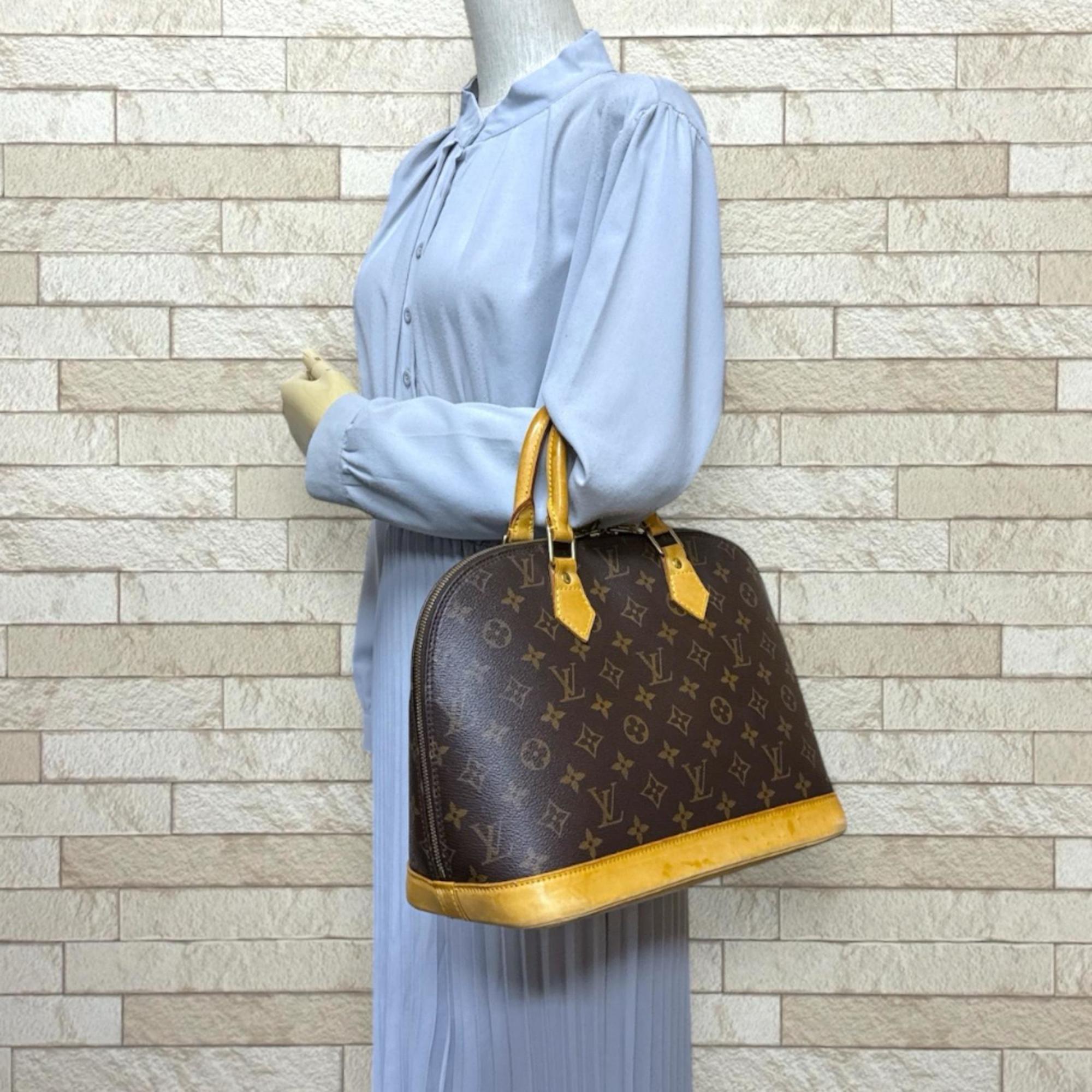 Louis Vuitton Brown Monogram Canvas Handbag