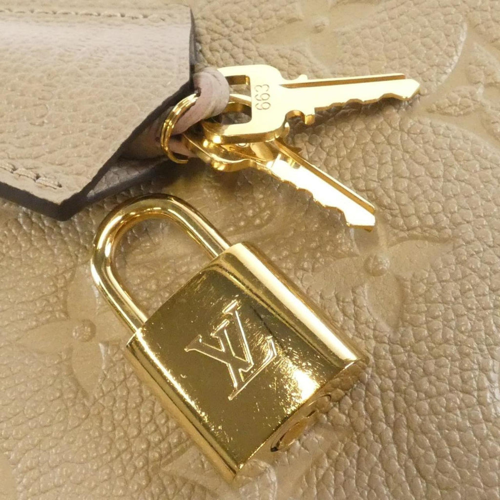 Louis Vuitton Tourterelle Leather Handbag