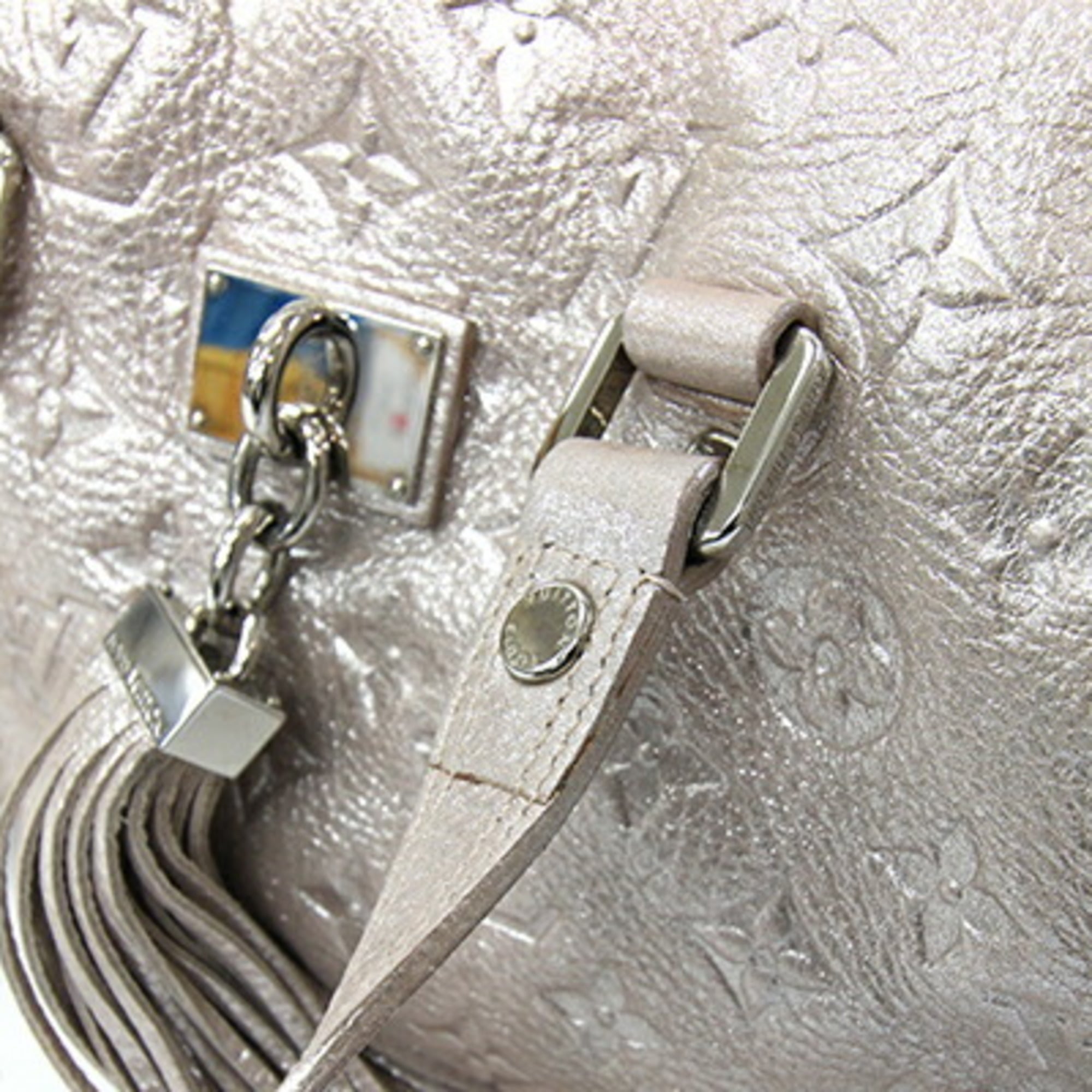 Louis Vuitton Peche Leather Handbag