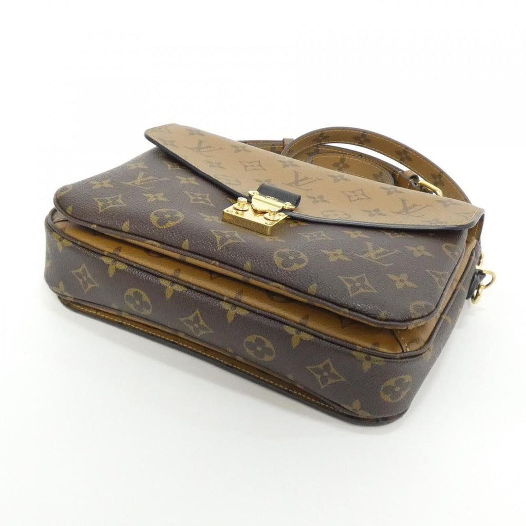 Louis Vuitton Brown Coated Canvas Handbag Pochette