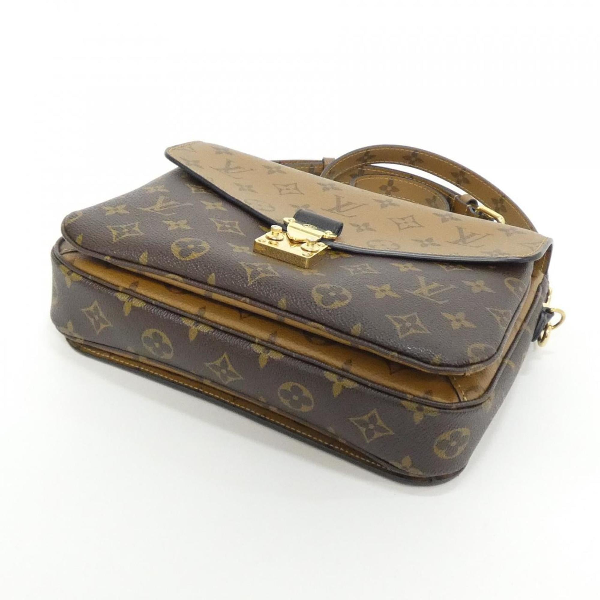 Louis Vuitton Brown Coated Canvas Handbag Pochette