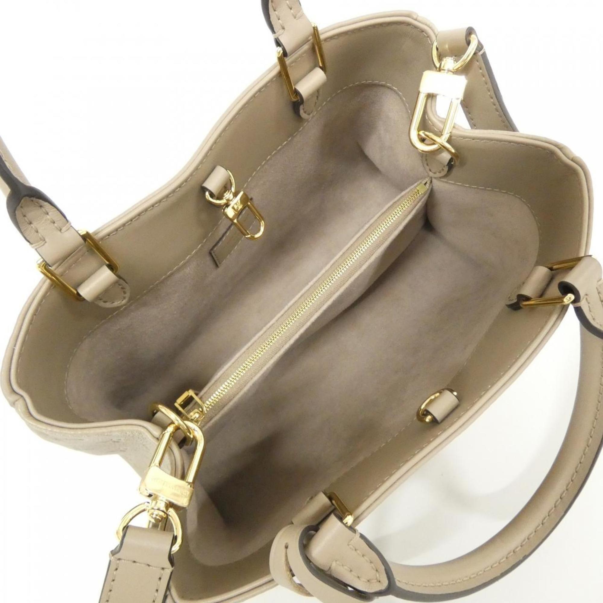 Louis Vuitton Monogram Empreinte Tourterelle Leather Handbag