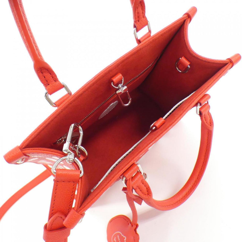Louis Vuitton Monogram Empreinte Rouge Leather Handbag