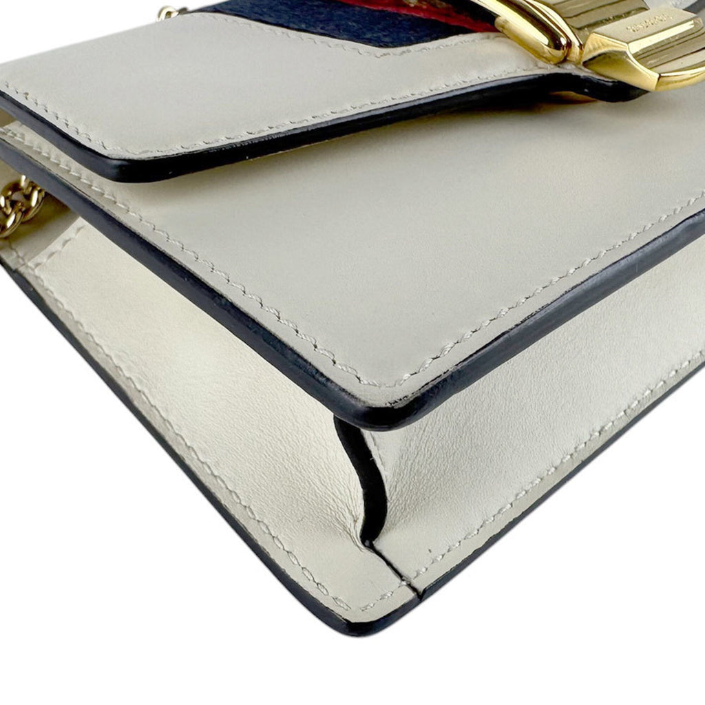 Gucci Gold Ivory Leather Metal Shoulder Bag (Pre-Owned)