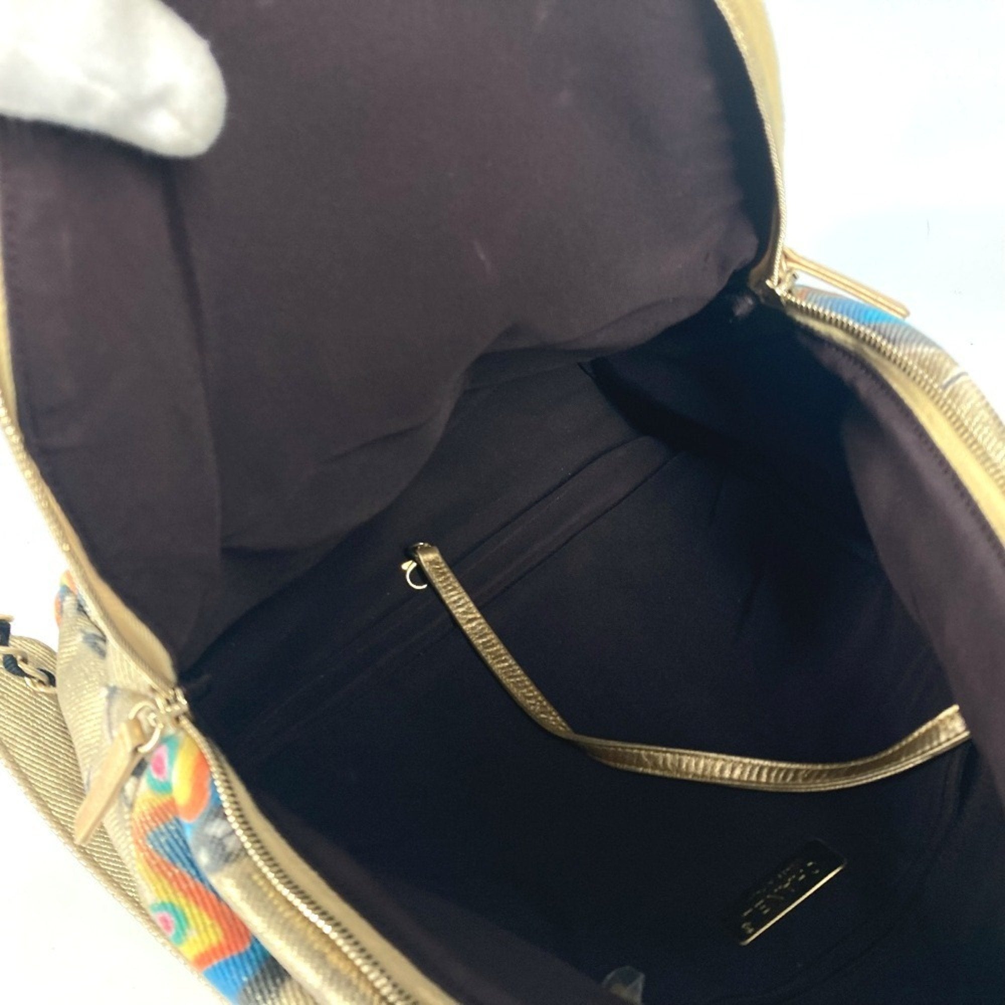 Chanel Gold Leather Canvas Backpack