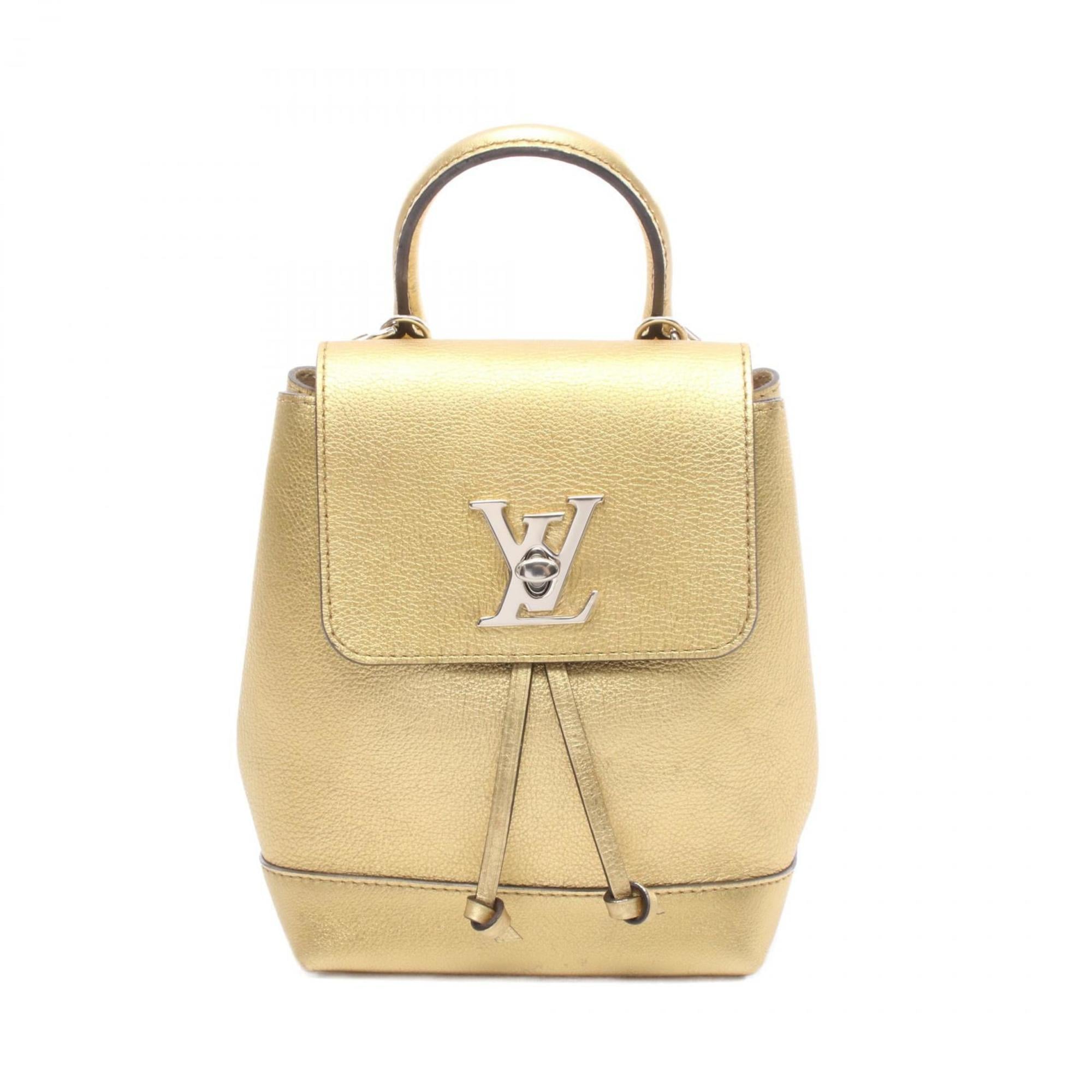 Louis Vuitton Gold Leather Backpack