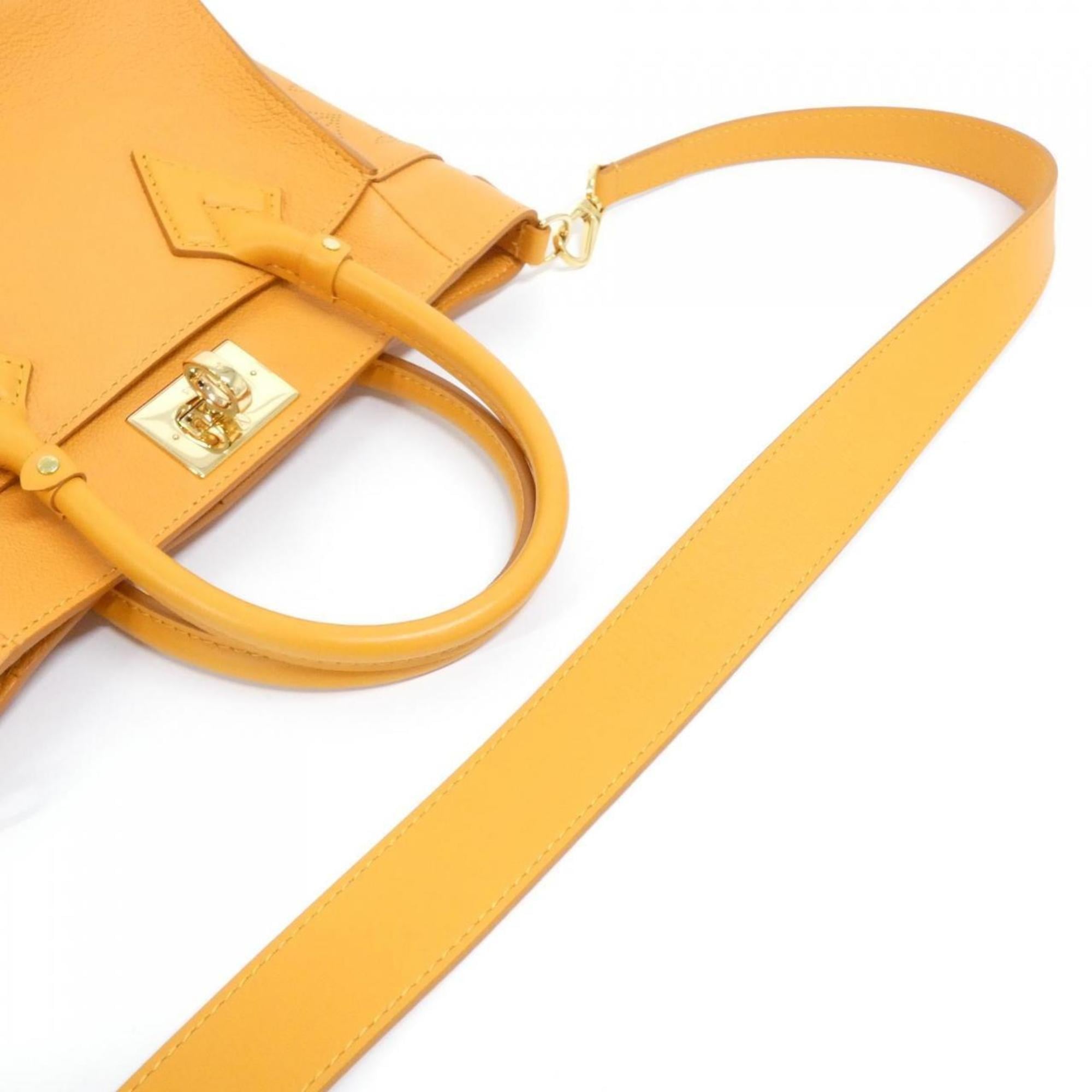 Louis Vuitton Gold Leather Handbag