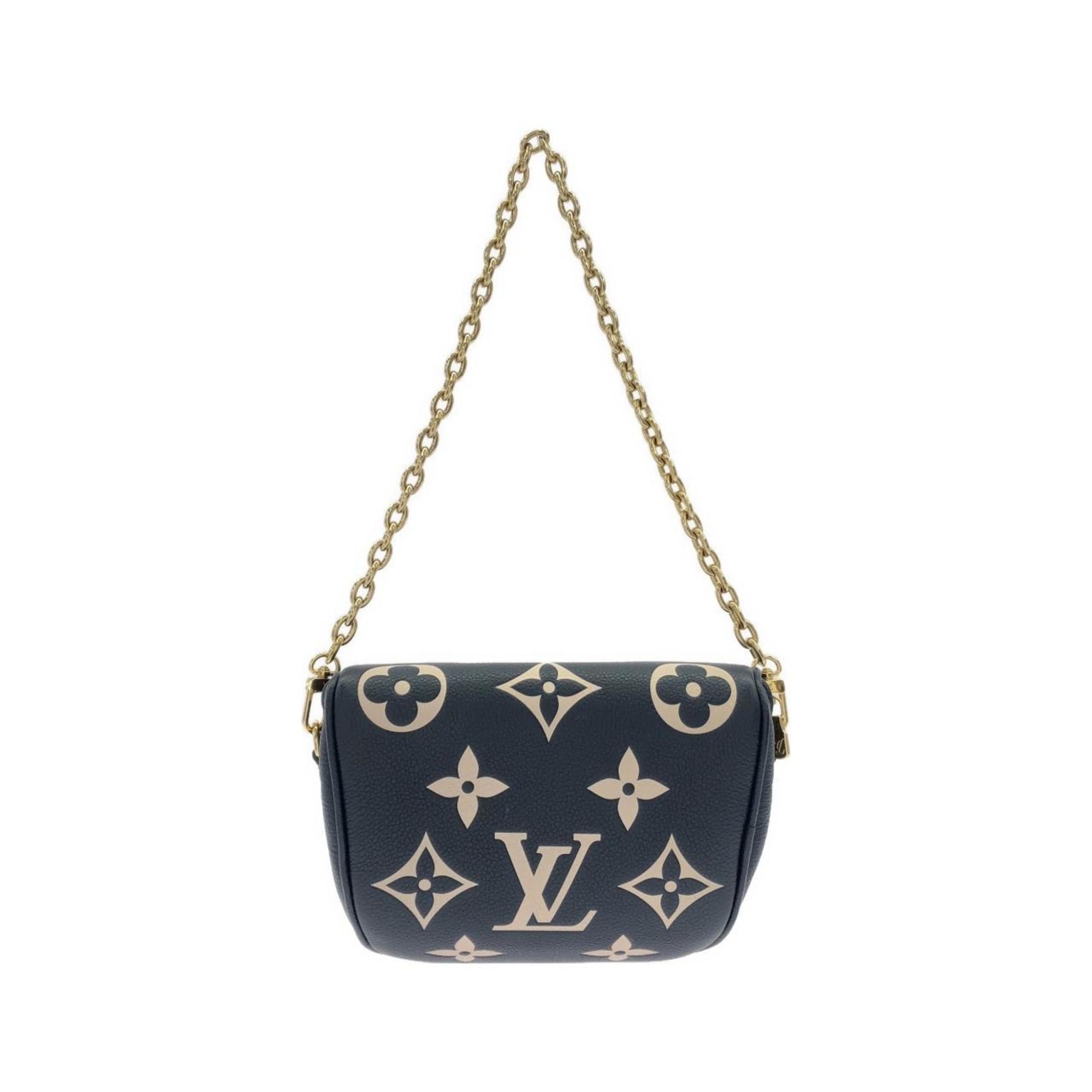 Louis Vuitton Cream Navy Leather Handbag