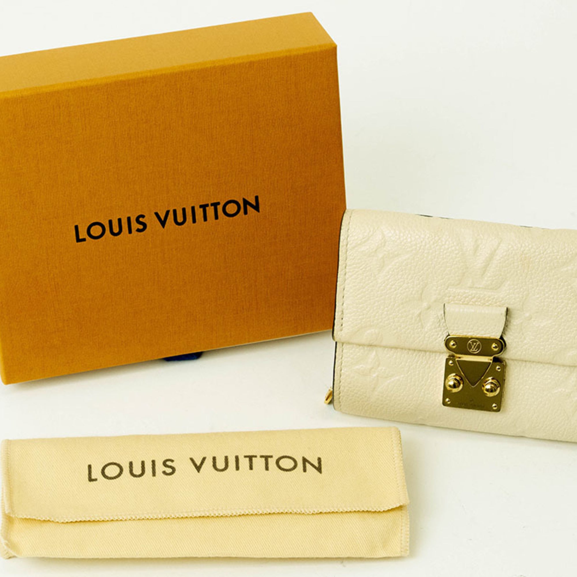 Louis Vuitton Cream Monogram Empreinte Leather Wallet