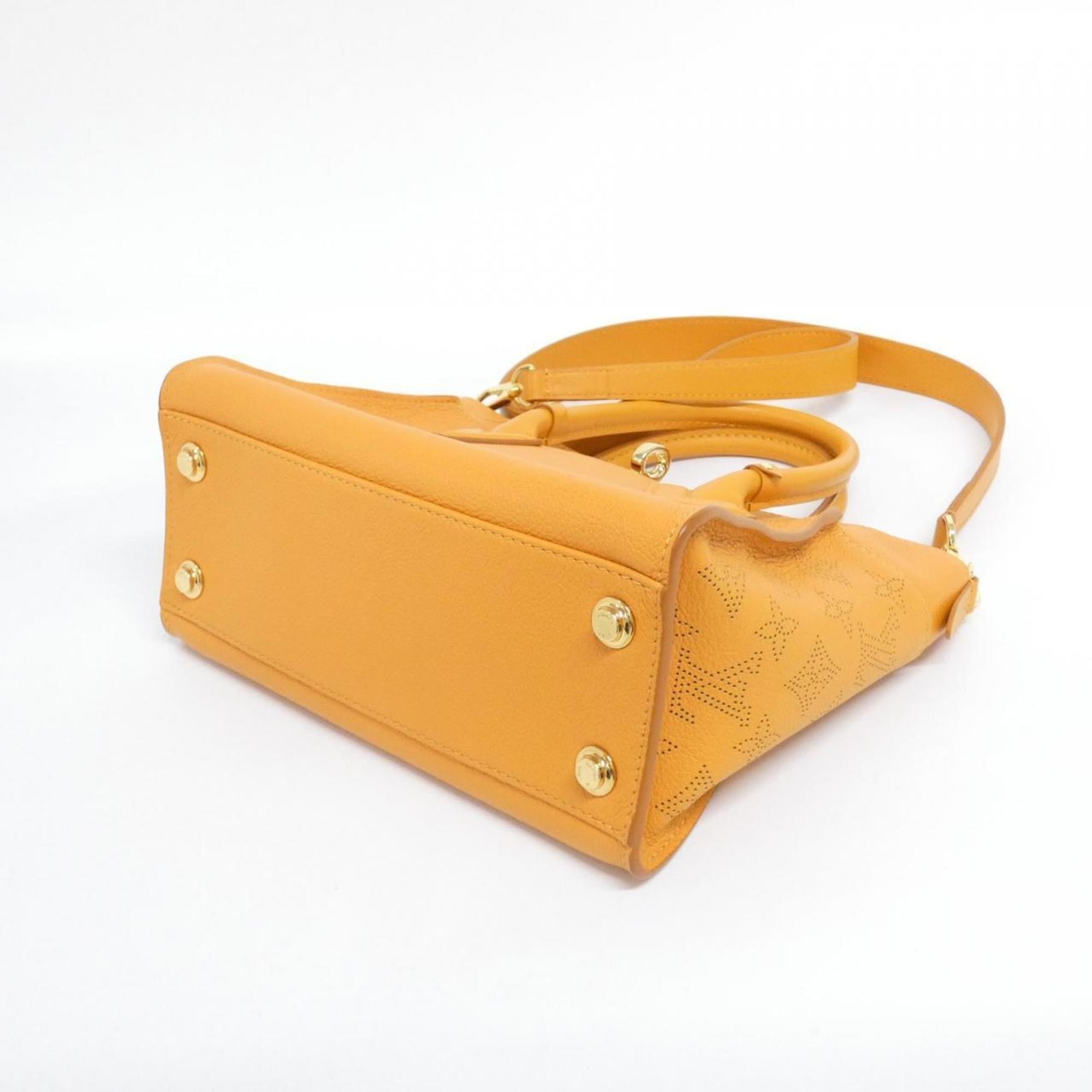 Louis Vuitton Gold Leather Handbag