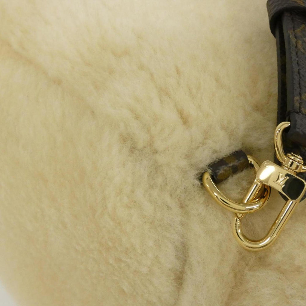 Louis Vuitton Cream Coated Canvas Backpack