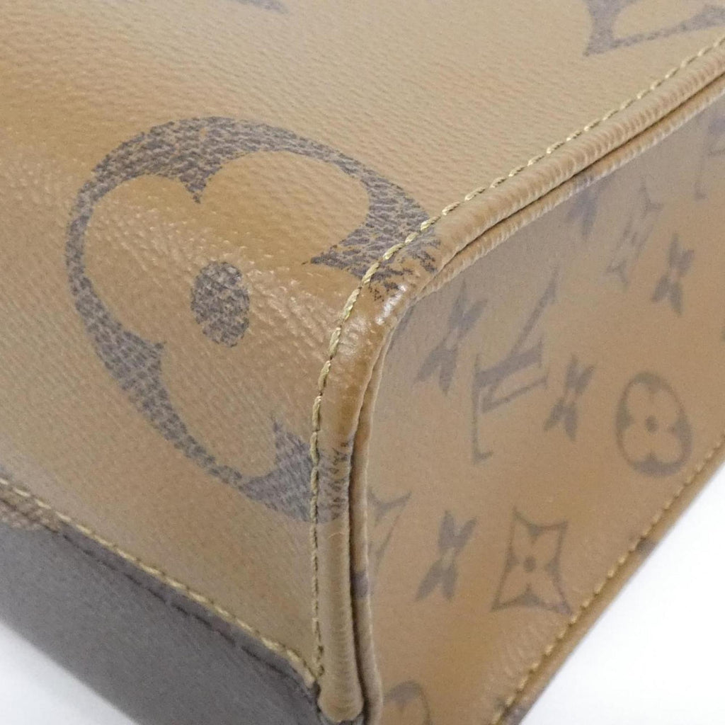 Louis Vuitton Brown Coated Canvas Handbag