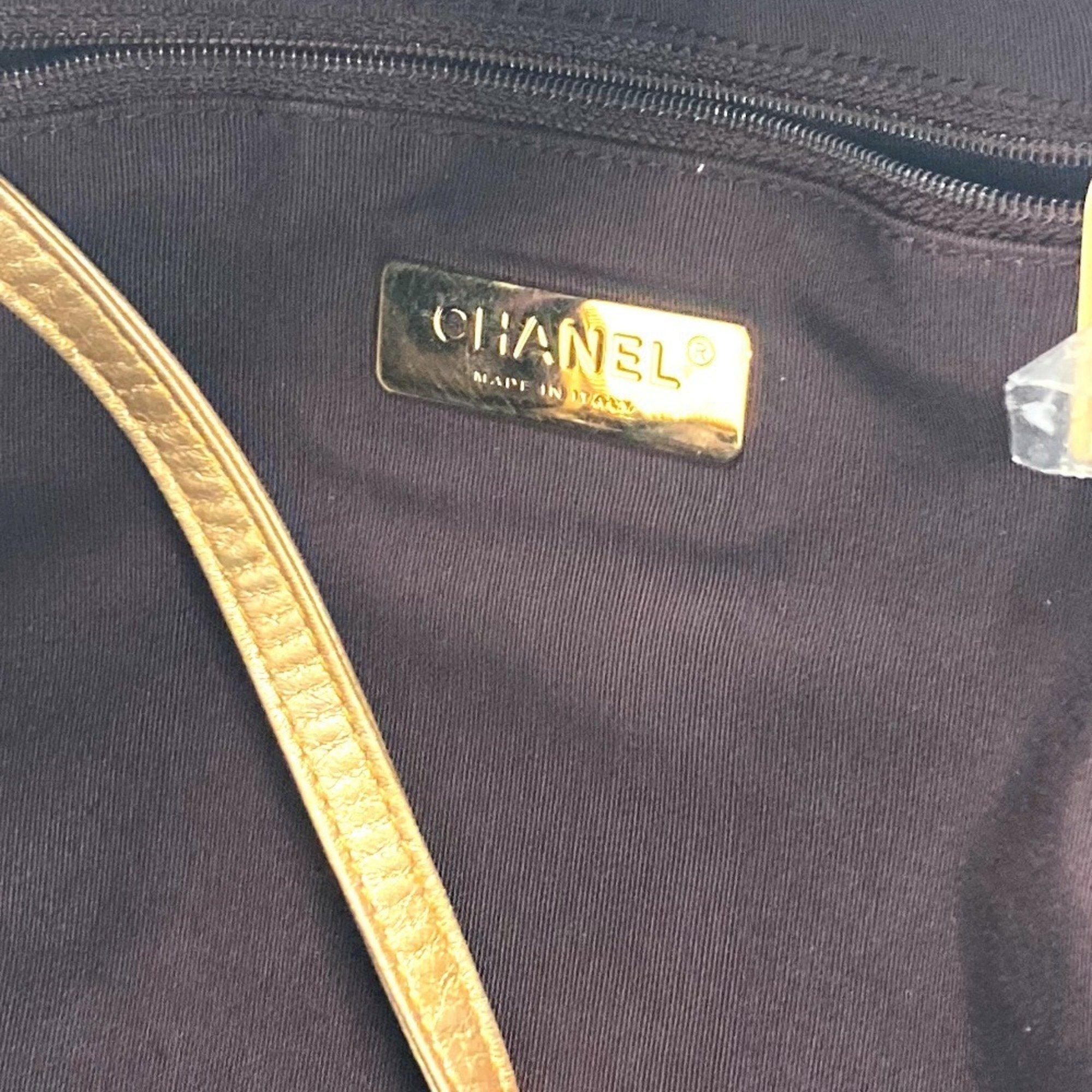 Chanel Gold Leather Canvas Backpack