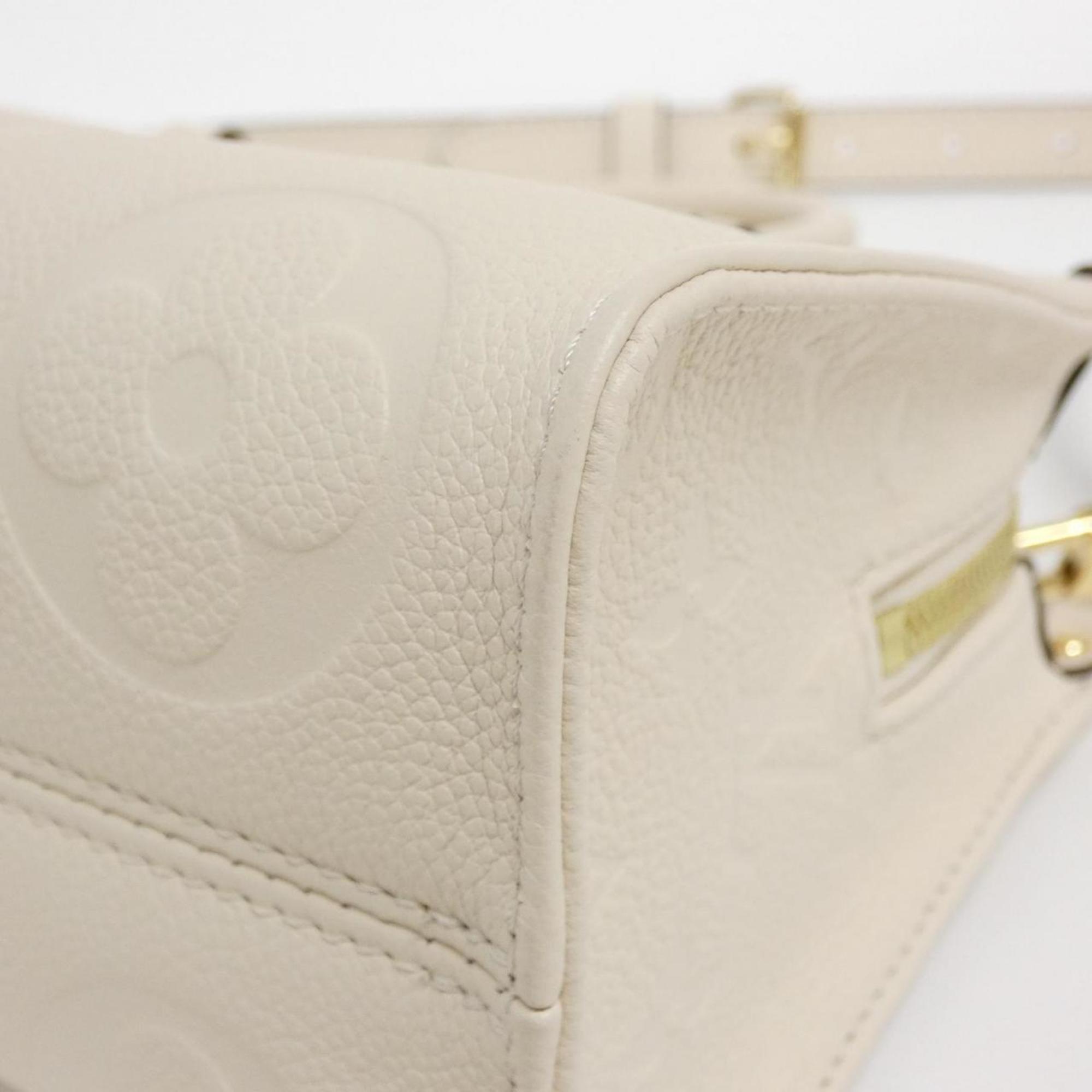 Louis Vuitton Monogram Empreinte Gold Leather Handbag