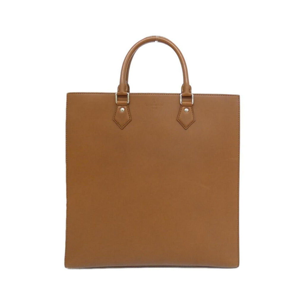 Louis Vuitton Nomad Silver Leather Handbag