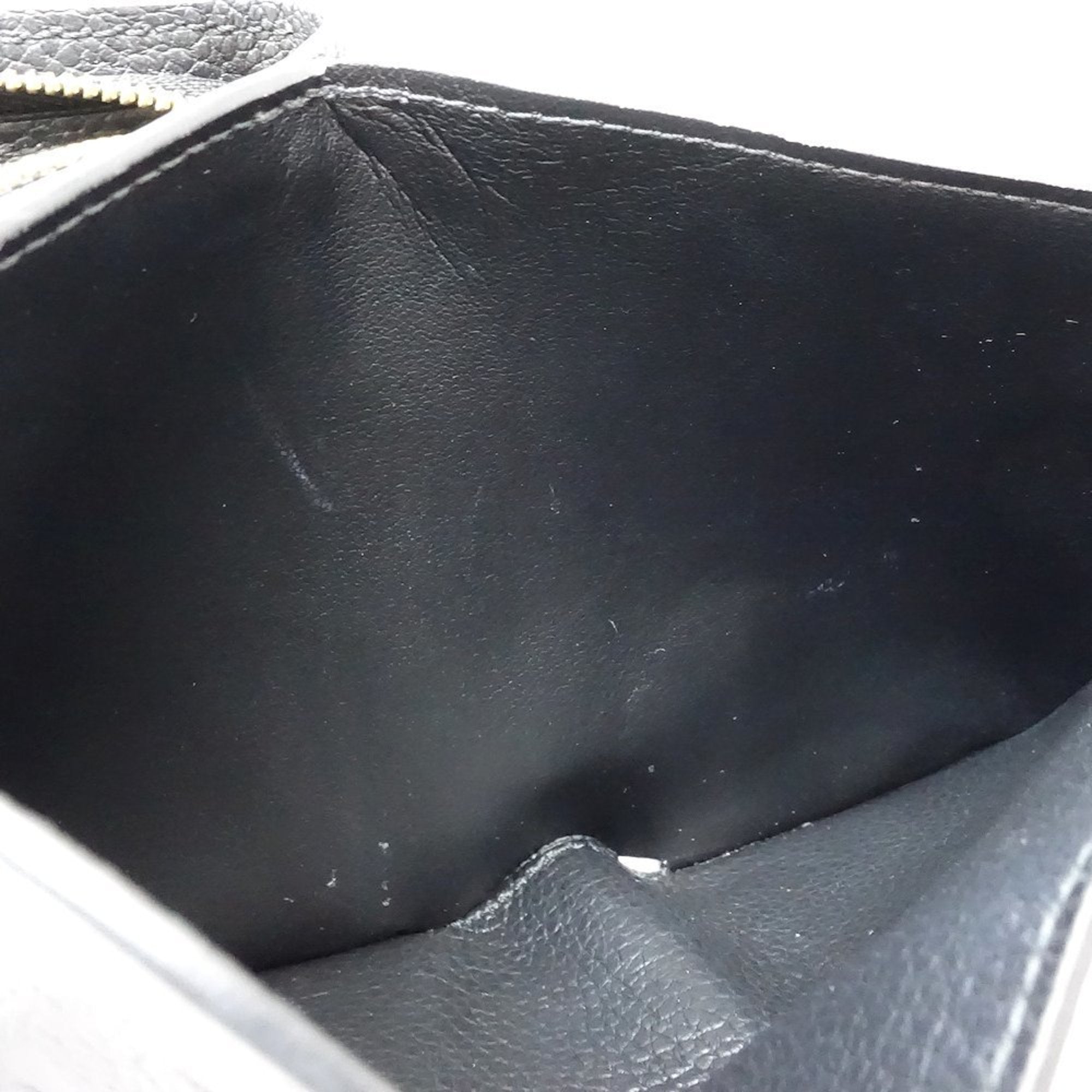 Louis Vuitton Monogram Empreinte Noir Leather Wallet