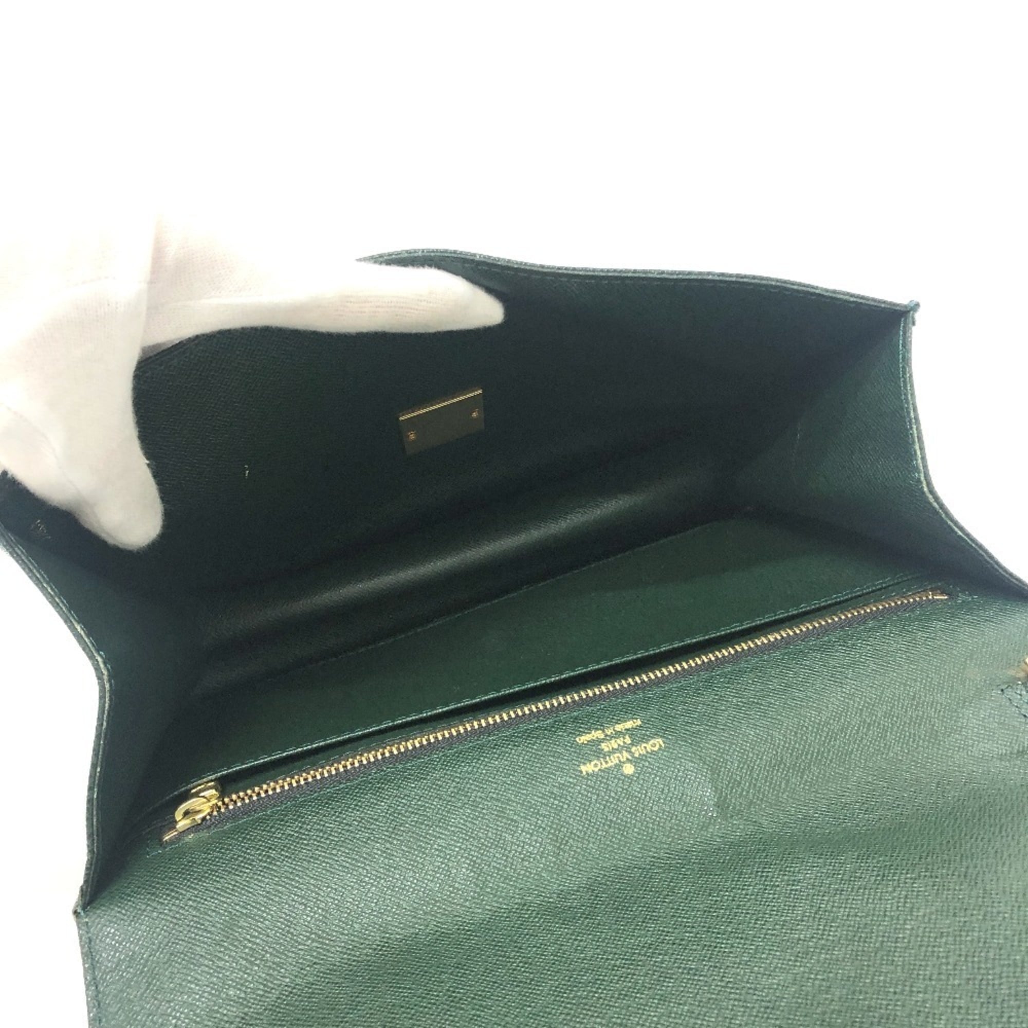 Louis Vuitton Episea Leather Taiga Leather Clutch Bag