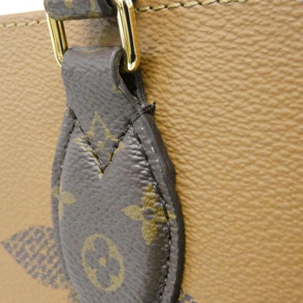 Louis Vuitton Marron Coated Canvas Handbag