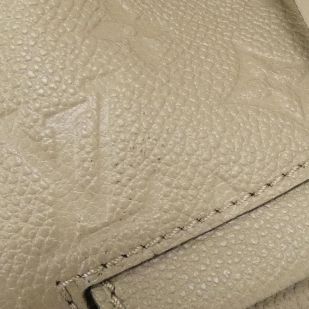 Louis Vuitton Monogram Empreinte Tourterelle Leather Backpack