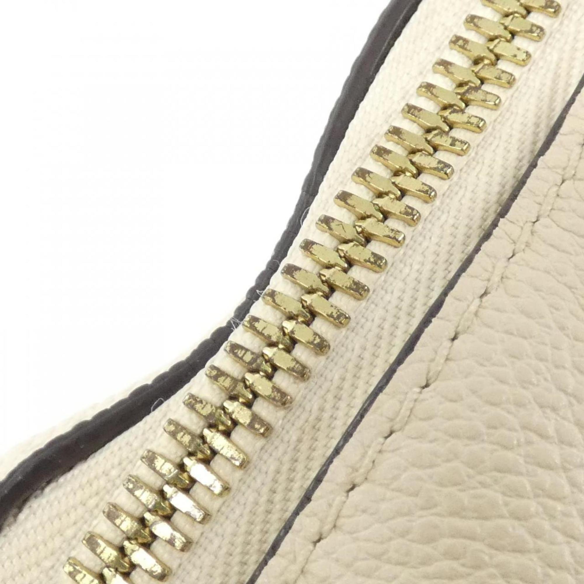 Louis Vuitton Monogram Empreinte Gold Leather Handbag
